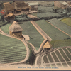 Bird eye view of rice feelds [sic.] and the homes.