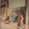 Pounding rice for rice cake.
