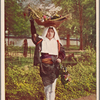 Oharame with basket of produce on head.
