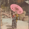 Girl with parasol carrying infant on back.