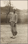 Man wearing traditional peasant clothing.