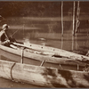 Fishing from a canoe.