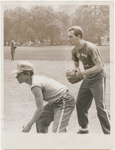 Broadway Show League members David Winters and Paul Newman playing softball, Central Park.