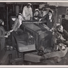 Army truck being prepped for shipment overseas