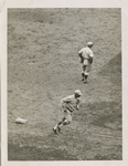Mgr. Cravath of the Phila. Natls. [Philadelphia Phillies] rounding 3rd after hit[t]ing a home run with two men on bases, pinch hitting for pitcher Rixey in 8th inning, two out.