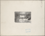 [Interior of room with man seated at table and woman coming down stairs.]