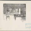 Interior of a room featuring a table on which a book is resting