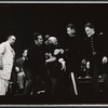 Albert Dekker (left), Herbert Berghof (center), Robert Burr (2nd from right), and cast members in the stage production The Andersonville Trial