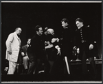 Albert Dekker (left), Herbert Berghof (center), Robert Burr (2nd from right), and cast members in the stage production The Andersonville Trial