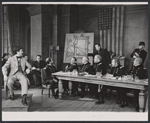Rober Carroll (sitting far left), Russell Hardie (sitting center of table), George C. Scott (standing left), Martin West (standing right), and cast members in the stage production The Andersonville Trial