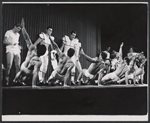 Ron Husmann (center standing) and cast members in the stage production All American