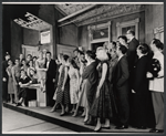 Judy Holliday, Sydney Chaplin, and ensemble in the stage production Bells Are Ringing