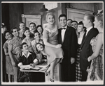 Judy Holliday and Sydney Chaplin (center) and ensemble in the stage production Bells Are Ringing