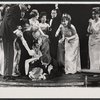 Alec Guiness [floor] and ensemble in the stage production Dylan