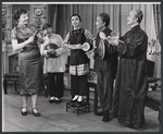 Cely Carrillo [center] Keye Luke [right] and ensemble in the stage production Flower Drum Song