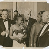 Sculptor Augusta Savage, with civic leader Channing Tobias, writer Max Eastman, artist Selma Burke and composer W. C. Handy, at the opening of the Salon of Contemporary Negro Art