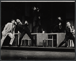 Tony Roberts [at left] and unidentified others in the stage production How Now Dow Jones