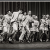 Tony Roberts [left foreground wearing a tie] and unidentified others in the stage production How Now Dow Jones
