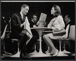 Marlyn Mason [sitting at right] and unidentified others in the stage production How Now Dow Jones