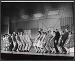 Ensemble in the stage production How to Succeed in Business Without Really Trying