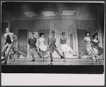Dancers in the stage production How to Succeed in Business Without Really Trying