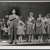 Rudy Vallee, Claudette Sutherland [center] and ensemble in the stage production How to Succeed in Business Without Really Trying