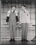 Hal England [right] and unidentified in the stage production How to Succeed in Business Without Really Trying