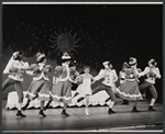 Valerie Lee (center) and company in the stage production Here's Love