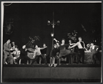 Elizabeth Seal [center] and ensemble in the stage production Irma La Douce