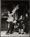 Dennis O'Keefe and ensemble in the stage production Never Live Over a Pretzel Factory