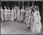 Cyril Ritchard (center) and company in the stage production The Happiest Girl in the World
