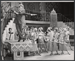 Swen Swenson [on table at left] and unidentified others in the touring stage production of the 1971 Broadway revival of No, No, Nanette