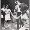 Michael Landrum [left], Nathan George [center] and unidentified others in the stage production No Place to be Somebody