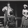 Willoughby Goddard [standing left], Hope Jackman [standing right] and unidentified [with back turned to camera in foreground] in the stage production Oliver!