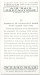 Removal of incendiary bomb with scoop and hoe.