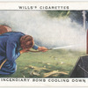 Incendiary bomb cooling down. (Preliminary fire extinguishing with jet from stirrup hand pump).