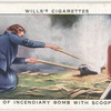 Removal of incendiary bomb with scoop and hoe.