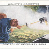 Control of incendiary bomb. (Pouring on sand from scoop).