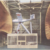 Aircraft suspended in wind-tunnel.