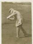 John D. Rockefeller playing golf.
