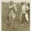 John D. Rockefeller playing golf.]