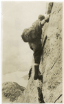 Traverse on face of cliff, ascent of Mt. Moran, Tetons, Wyoming.