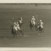 Polo : two players competing for the ball.