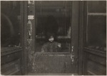 Girl at door, New York City