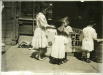 Four children on a sidewalk, New York City