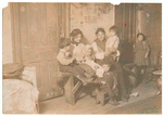 Mother with six children in a tenement