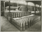 Woman handling 9 inch shells