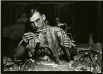 Glass worker making laboratory equipment in a Millville, New Jersey glass works