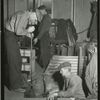 Glass blowers in a glass factory
