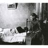 Girl and sick father, New York tenement